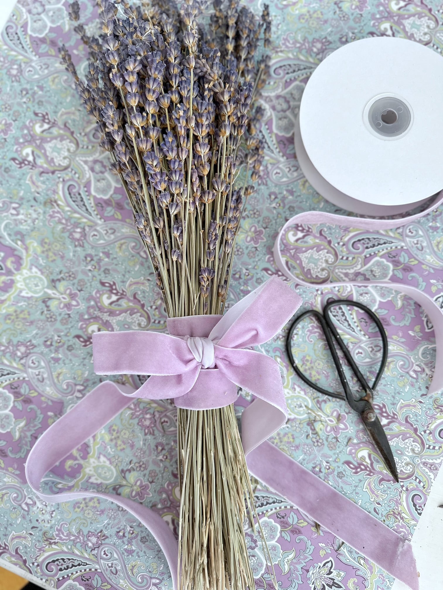 A beautiful bundle of dried lavender with a bow.