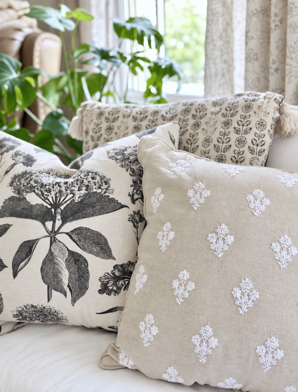 Every day neutral pillows on a sofa.