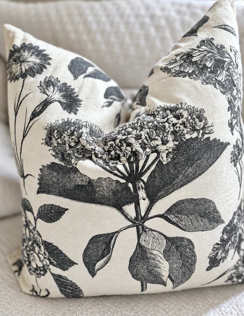 A pillow with a down insert that has a chop shape on the top.