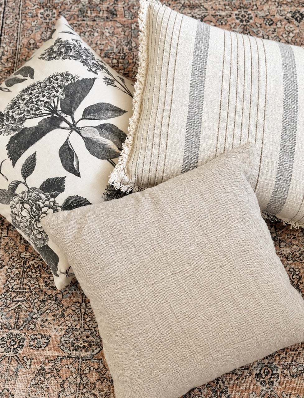 3 pillows on the floor. A good way to see if they go together.