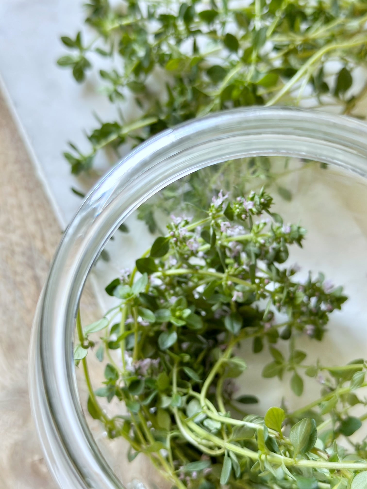 A jar of thyme stems to make Thyme honey. 