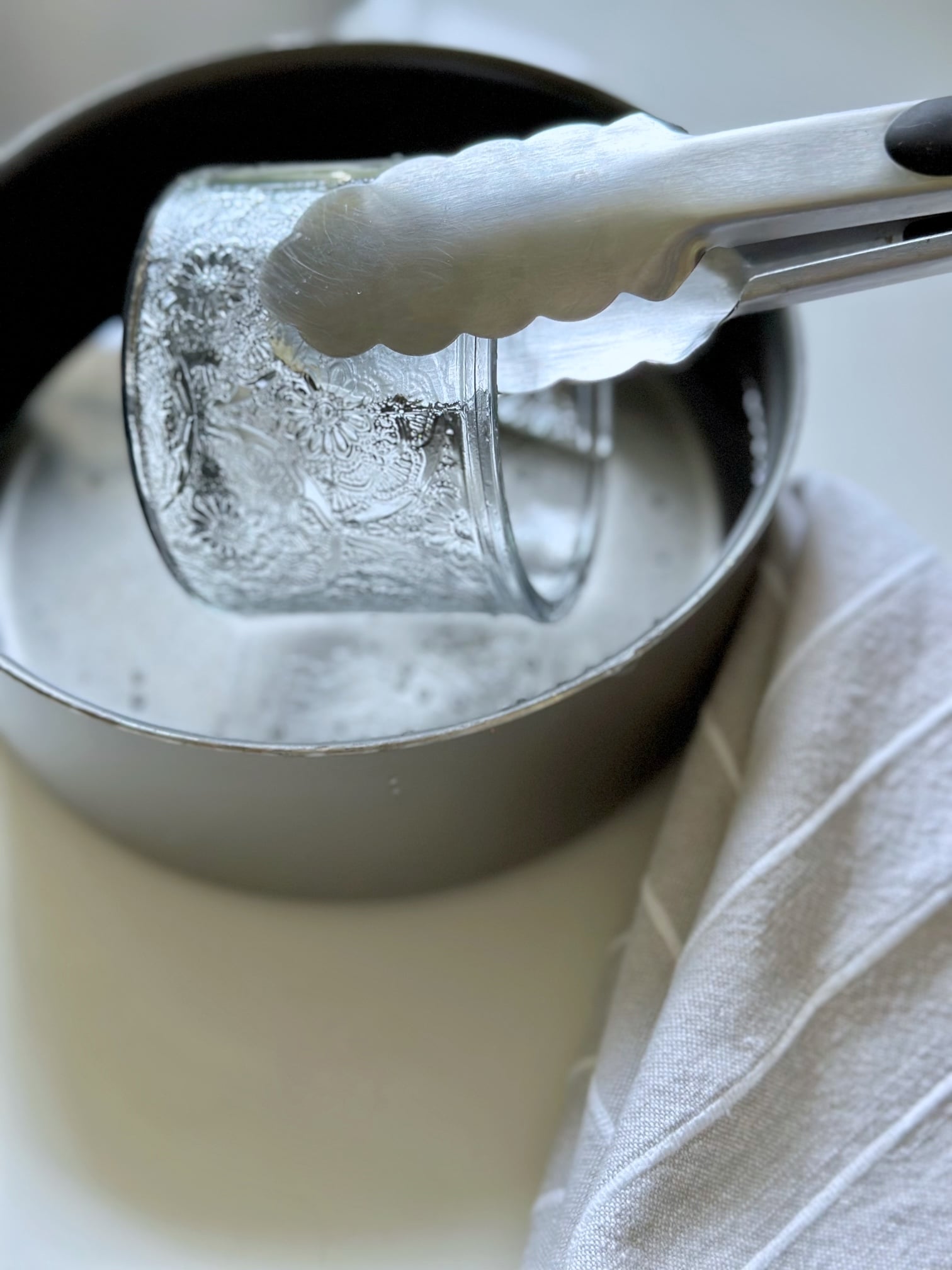 Sterilizing the jars in boiling water. 