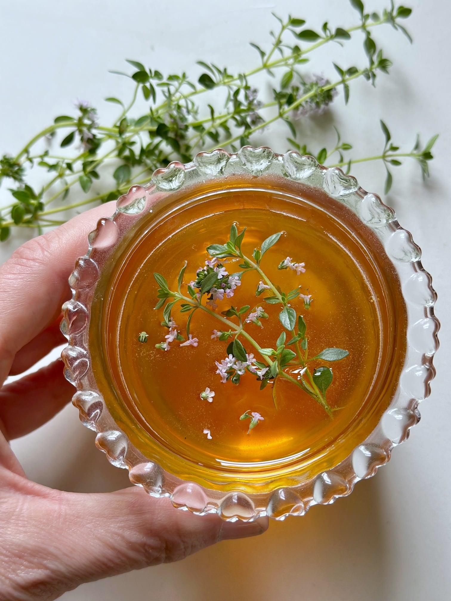 Honey with thyme leaves in it. 