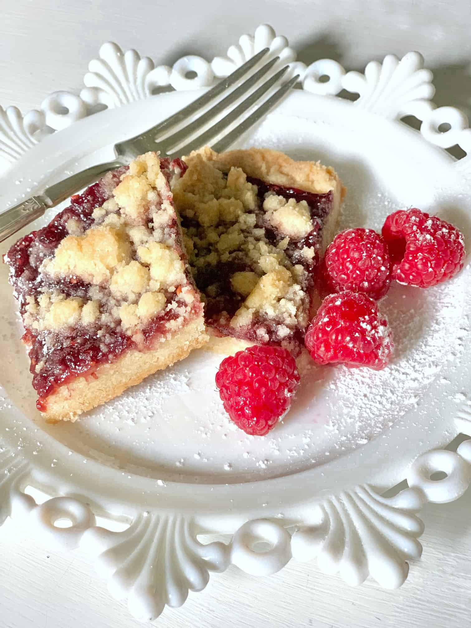 Two squares on a plate with a fork.