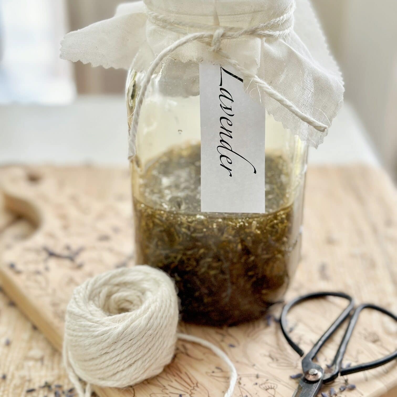 Honey steeping in a jar over lavender. 