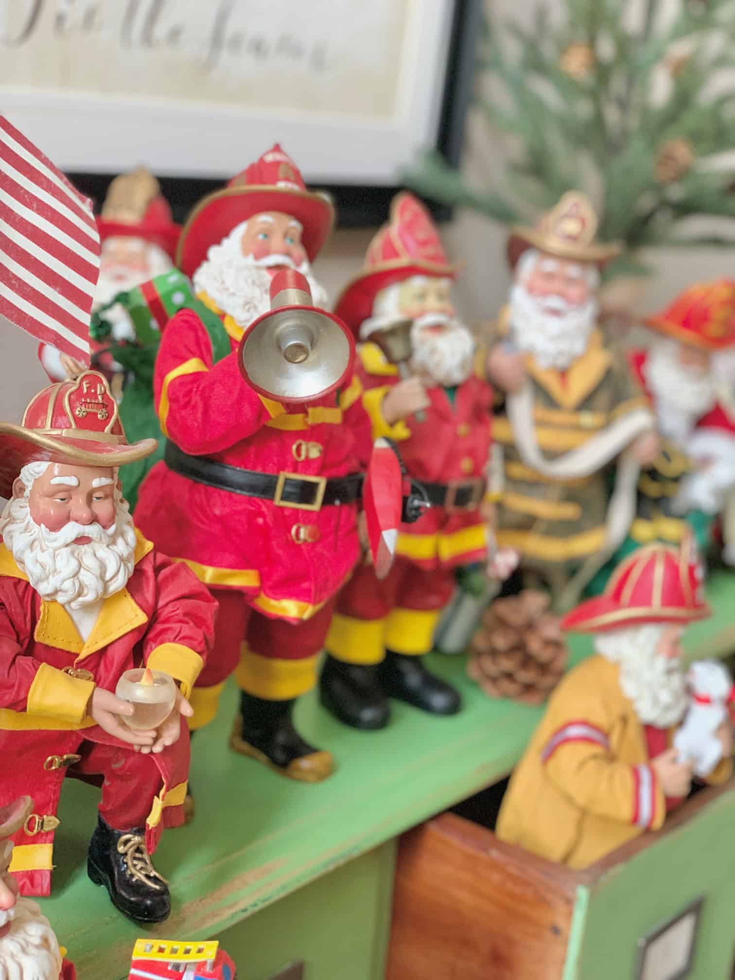 A side view of several fireman Santas standing on my apothecary. 