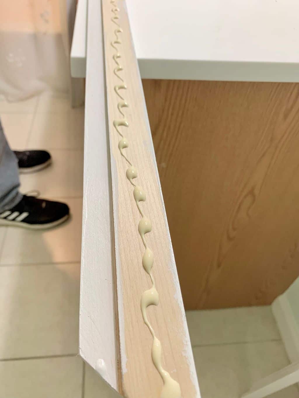 The glue along the trim piece. 