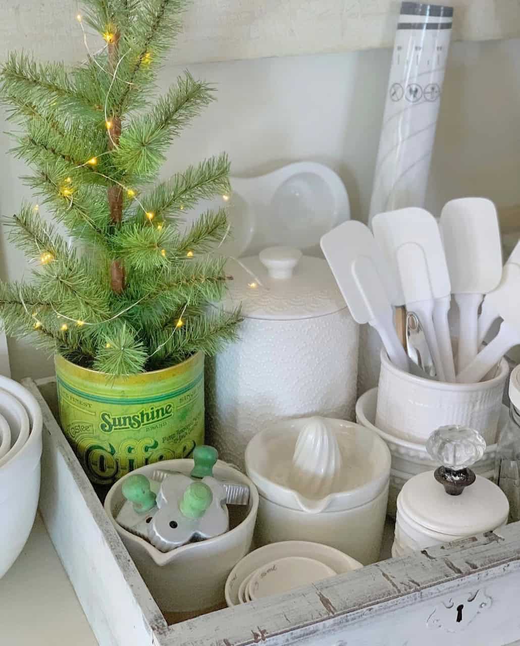 A collection of baking utensils in an old dresser drawer.