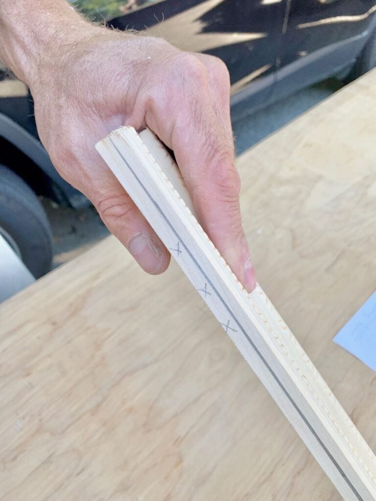 Marks to show which piece is being cut out. 