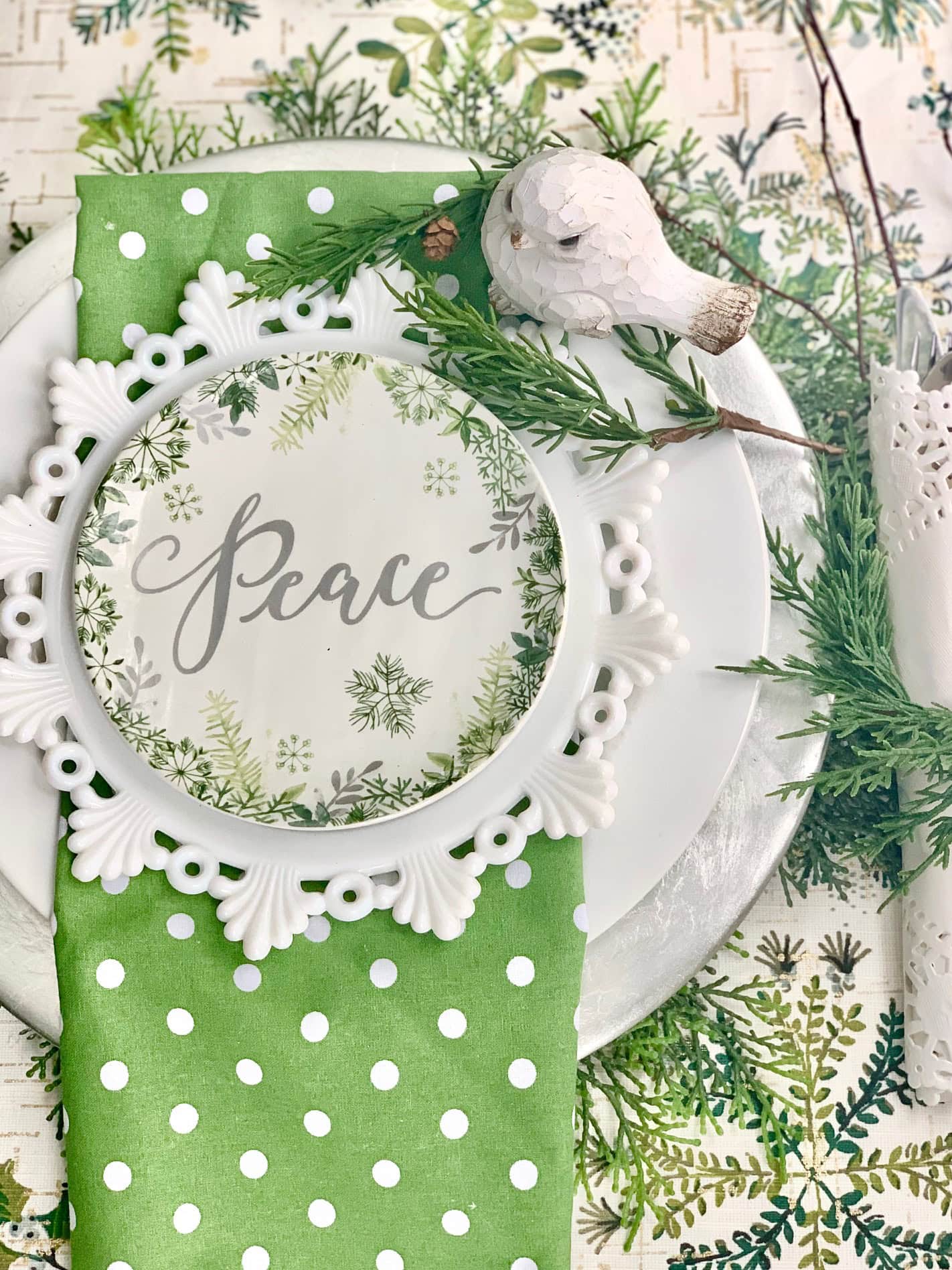 A vintage themed Holiday placesetting with a pretty milk glass salad plate.