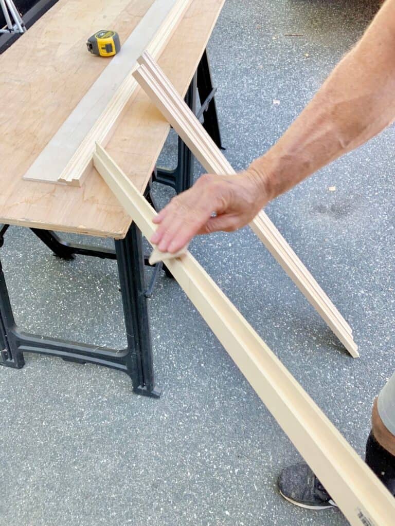 Sanding the edges where the cuts were made. 