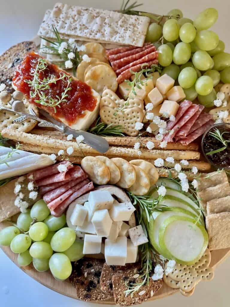 Babies breath dispersed throughout the board. 