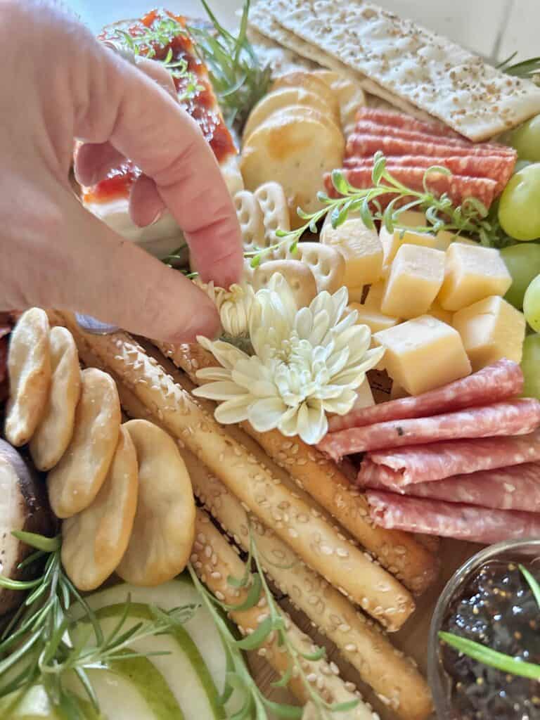 Placing a mum head on a board. 