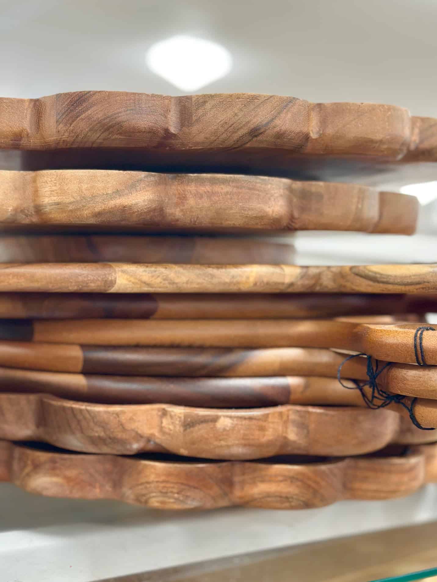 Stack of beautiful wooden boards for charcuterie. 