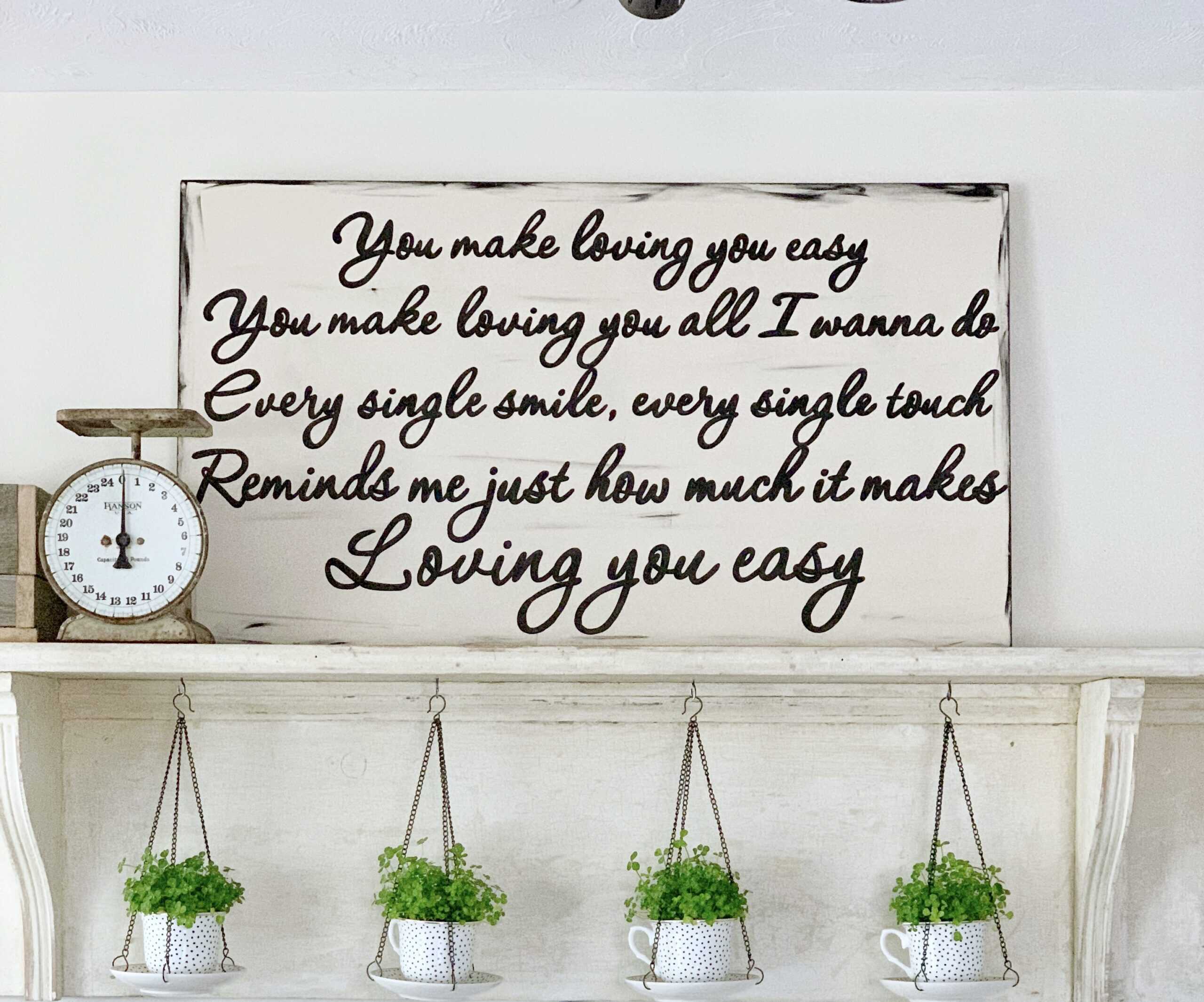 A process shot of decorating this mantel with shamrocks. 