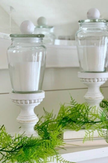 Candle display ideas using thrifted and vintage vessels.