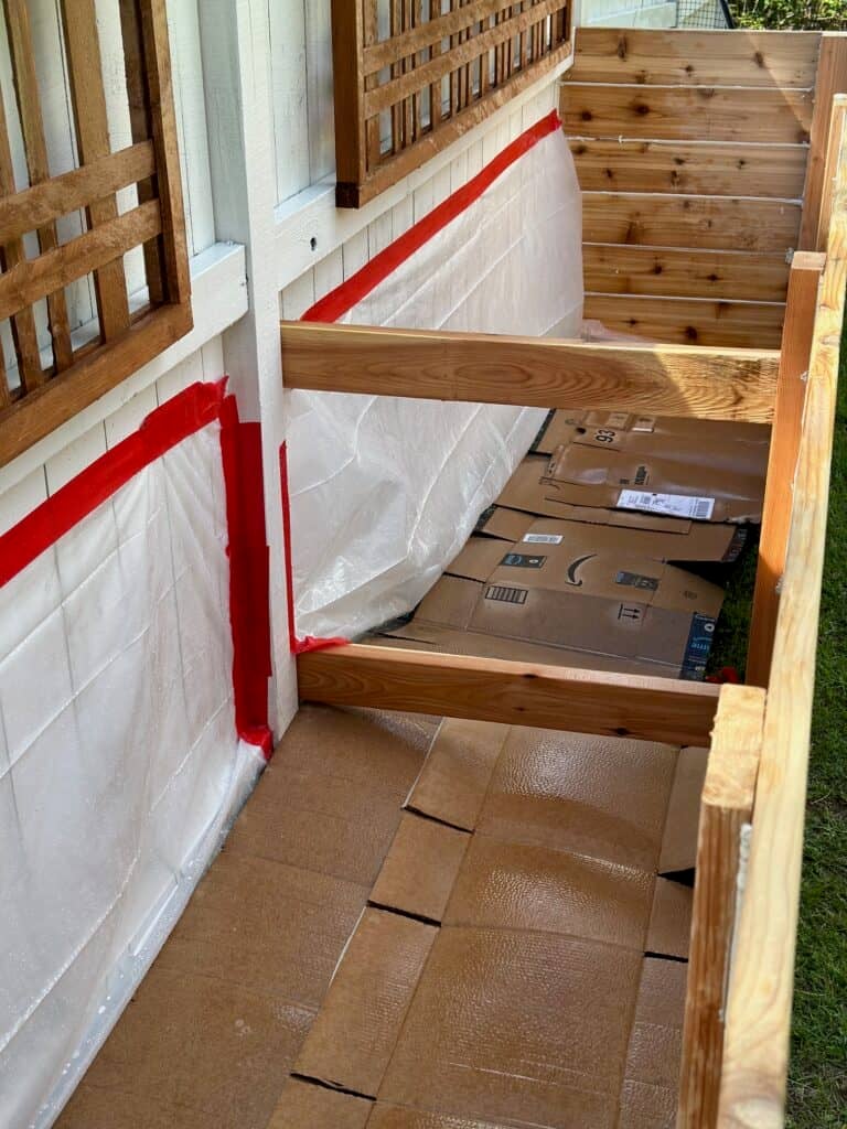 Adding cardboard to the bottom of the bed.