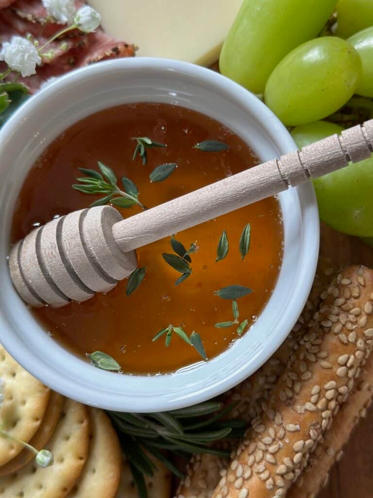 Thyme leaves on honey. 