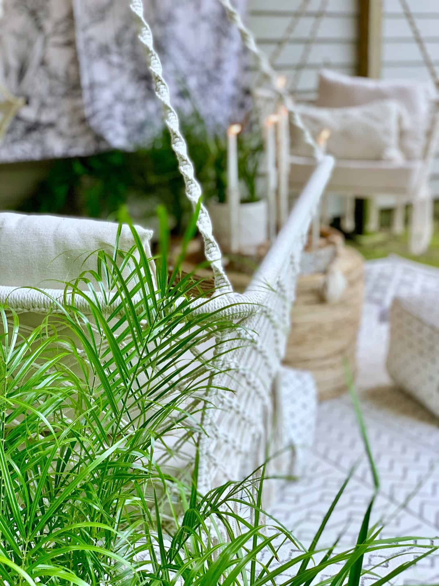 Stunning white hammock chairs having under the deck. 