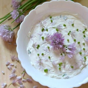 Fresh chive dip featuring chive flowers.
