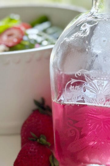 Beautiful pink chive blossom vinegar.