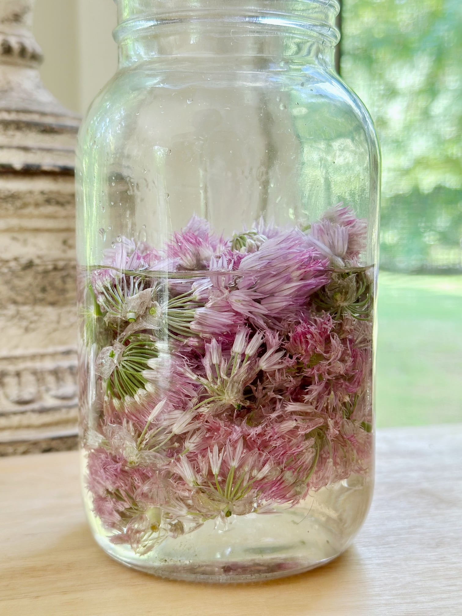 Vinegar over chive flowers. 