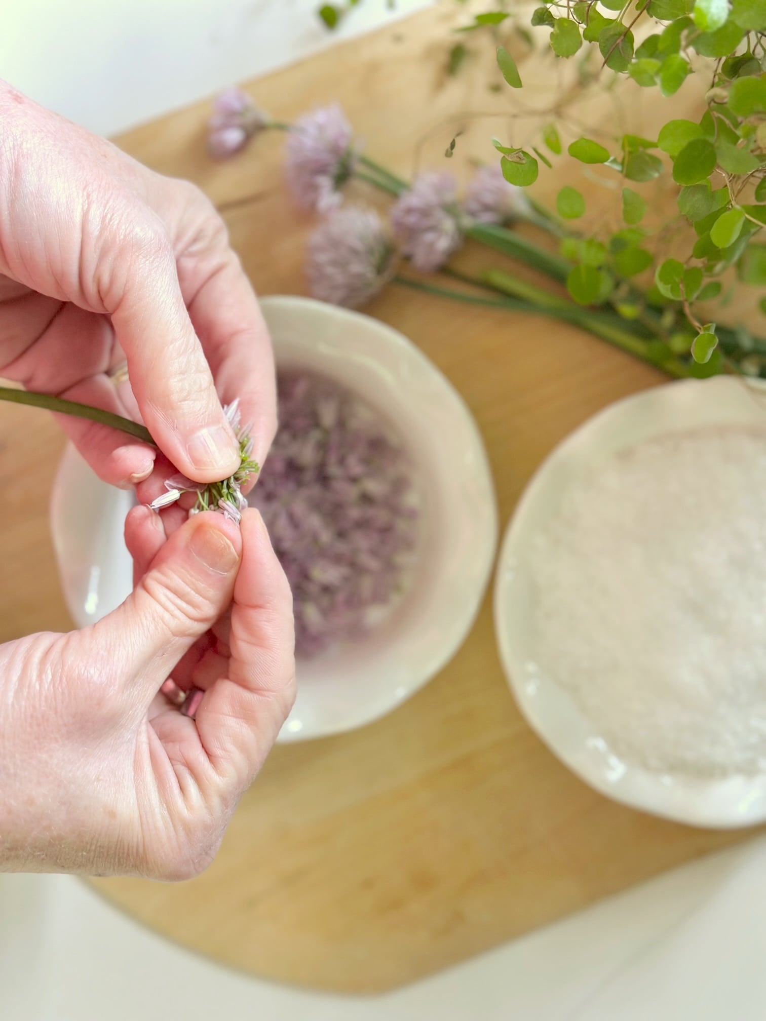 Separating the florets from the stem.