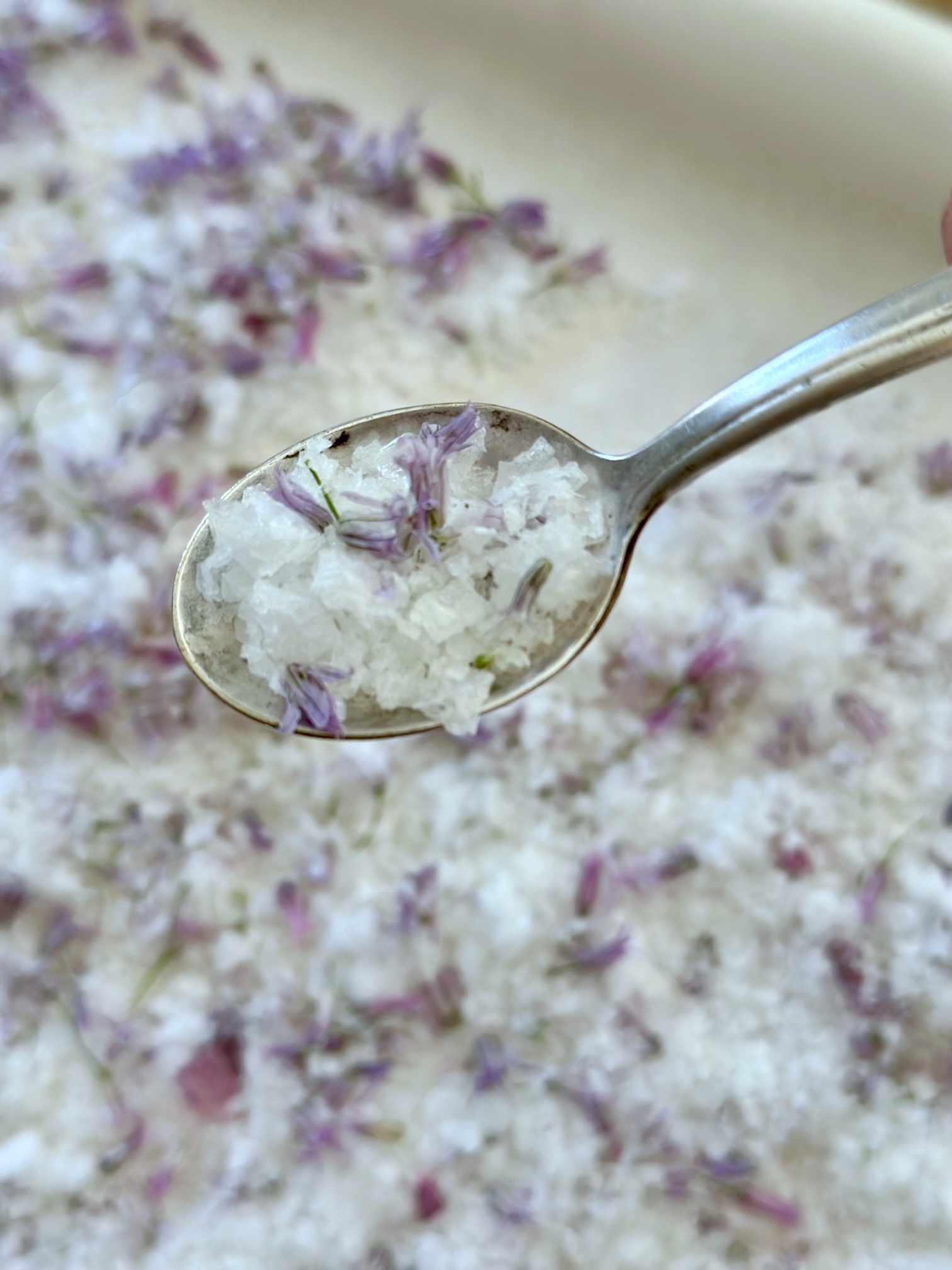 Spoonful of chive flower salt.