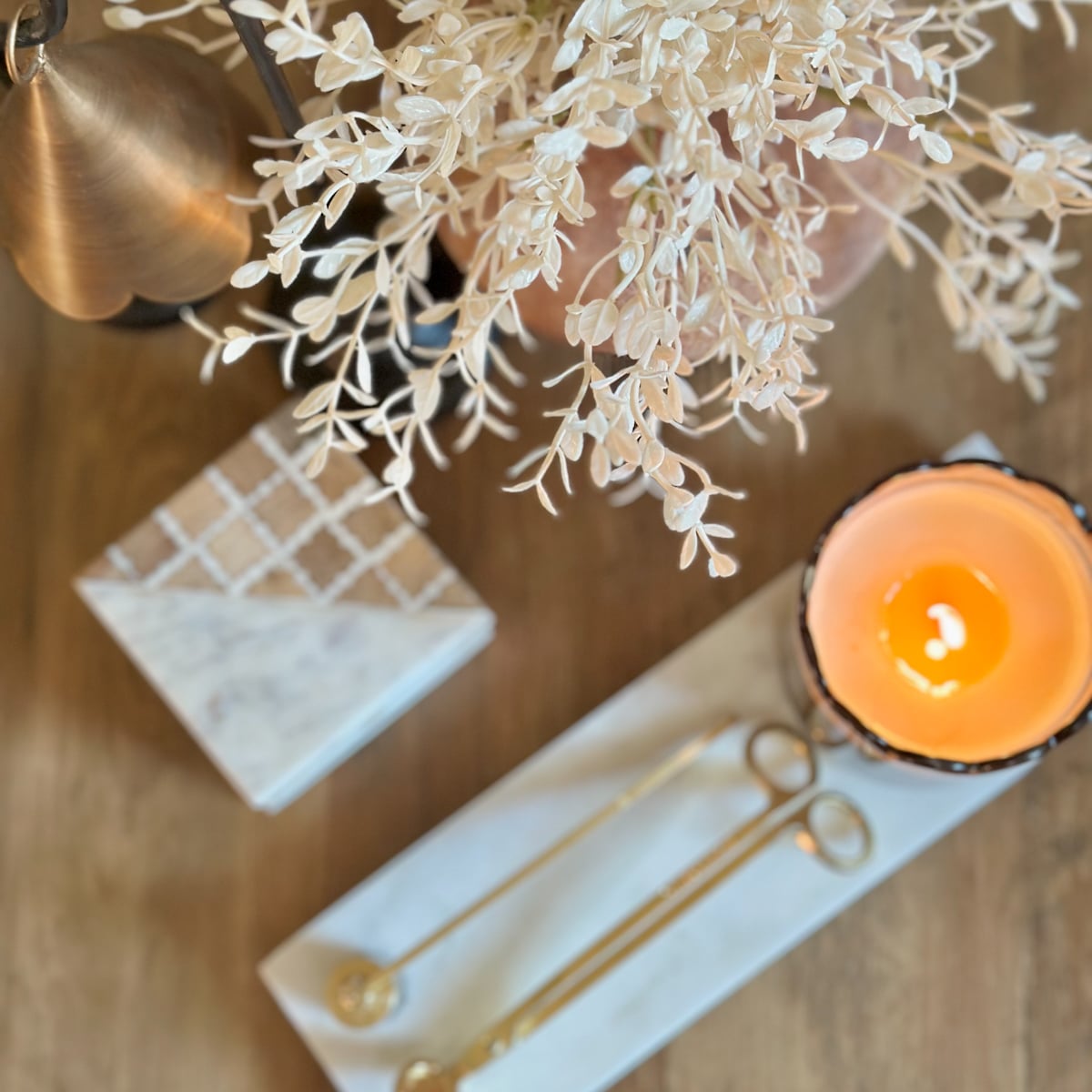 A decluttered view of coffee table decor.
