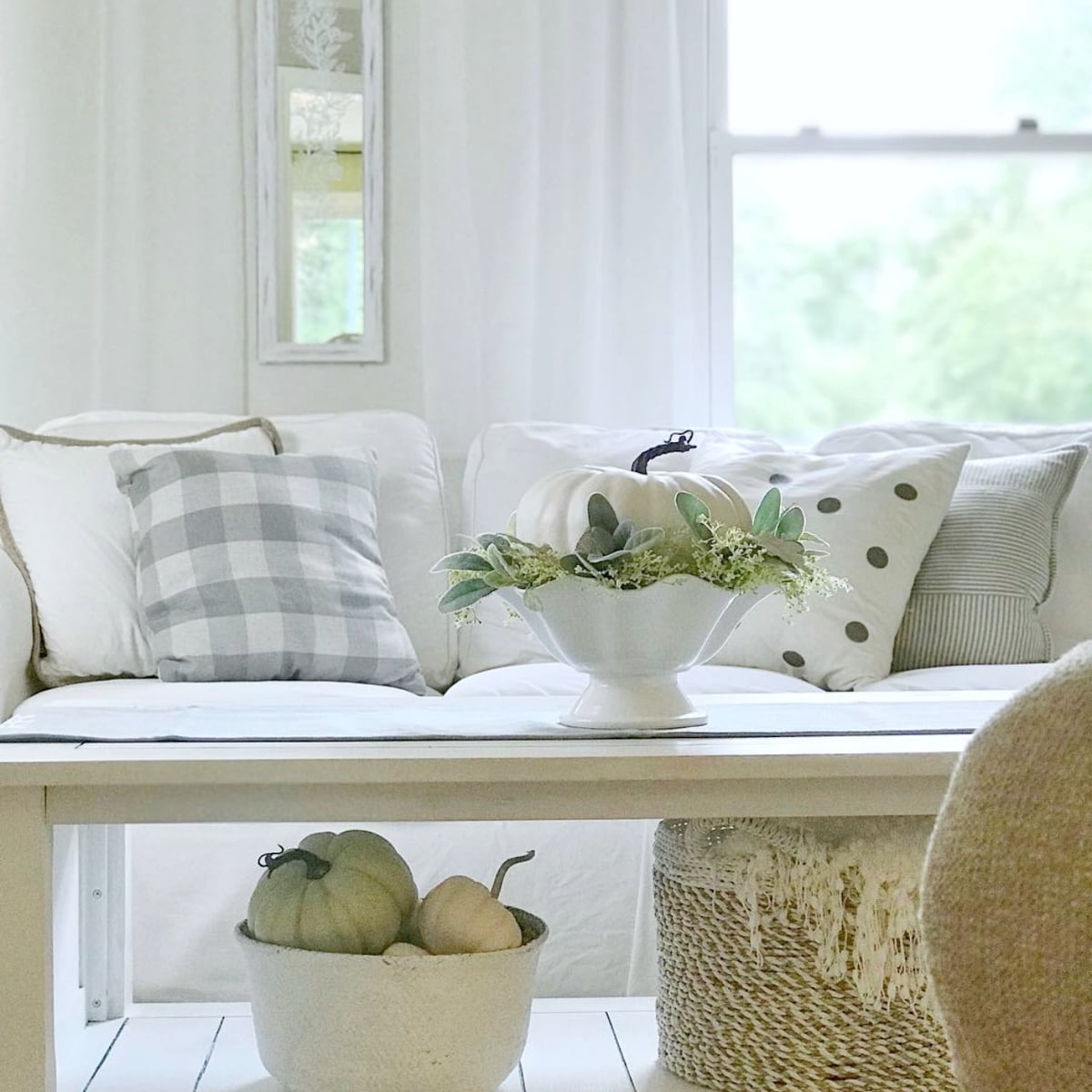 The footed bowl with the large white pumpkin sitting on our coffee table. 