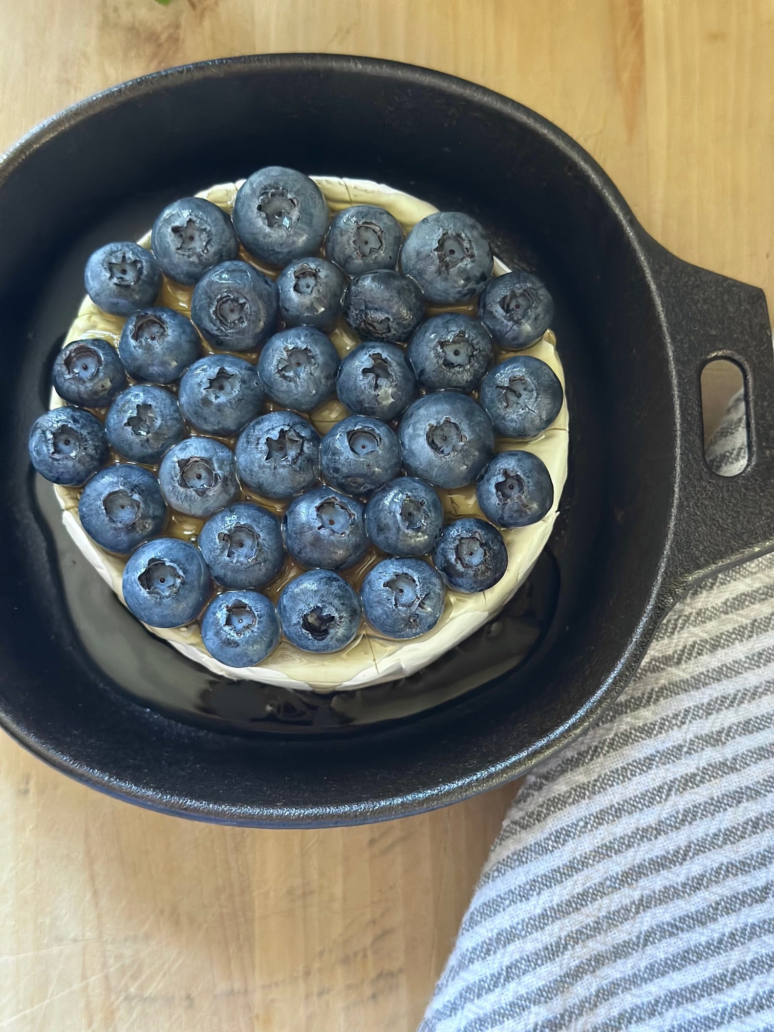Bake the blueberry baked brie until soft. 