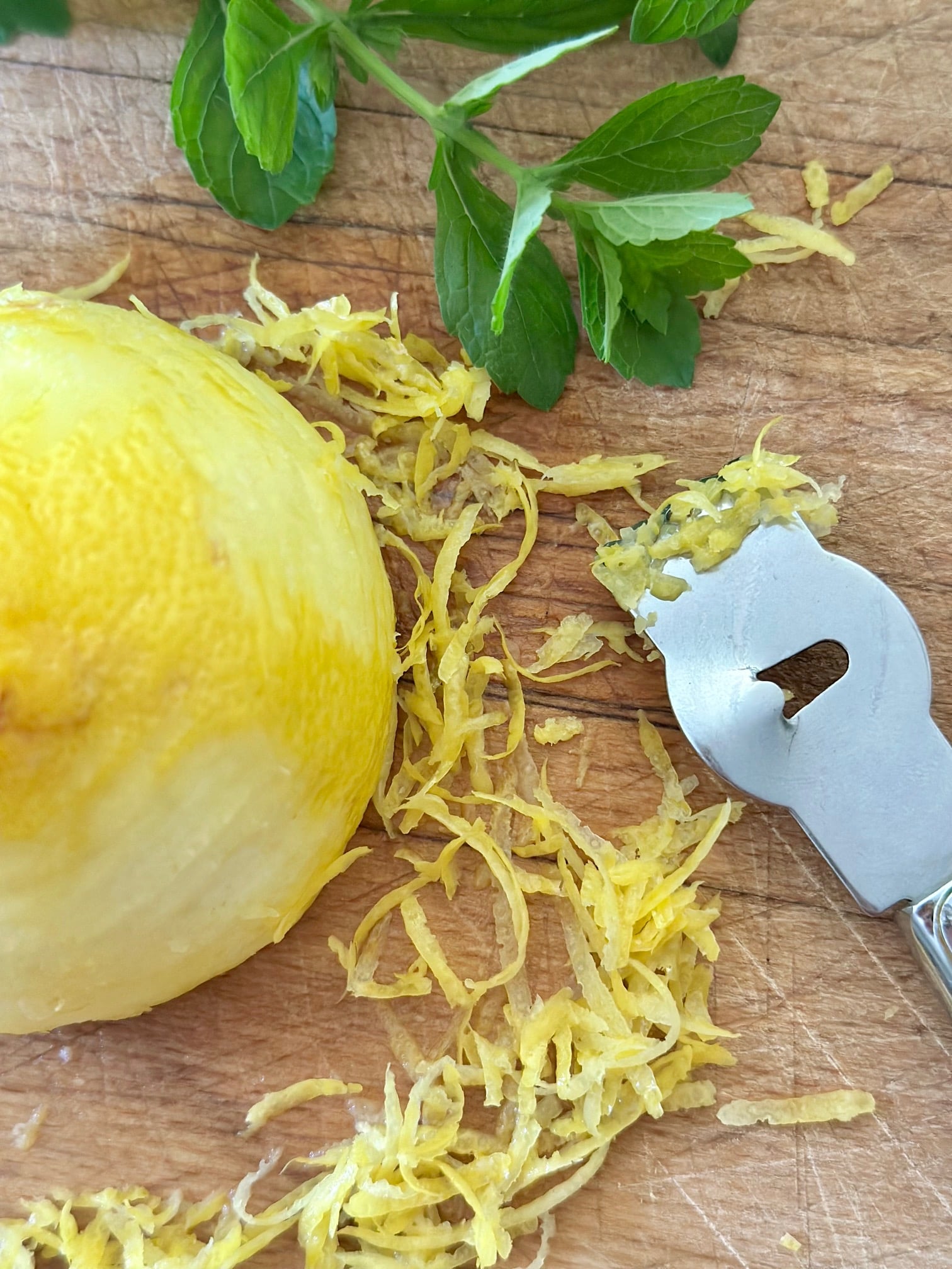 Zesting a fresh lemon.